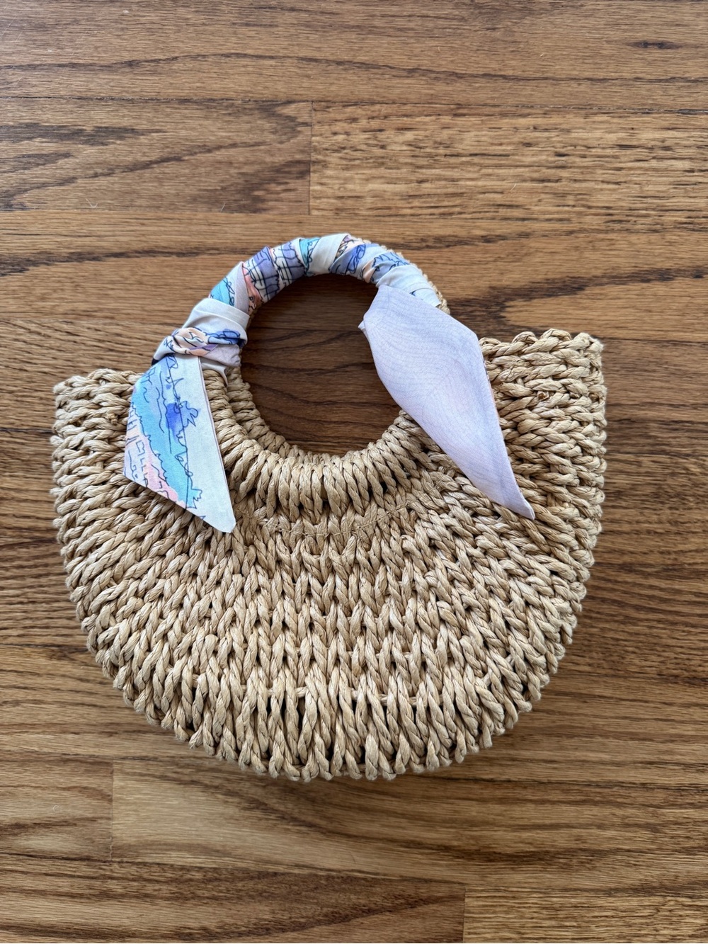 Straw Circle Handle Bag with Pastel Scarf Accent